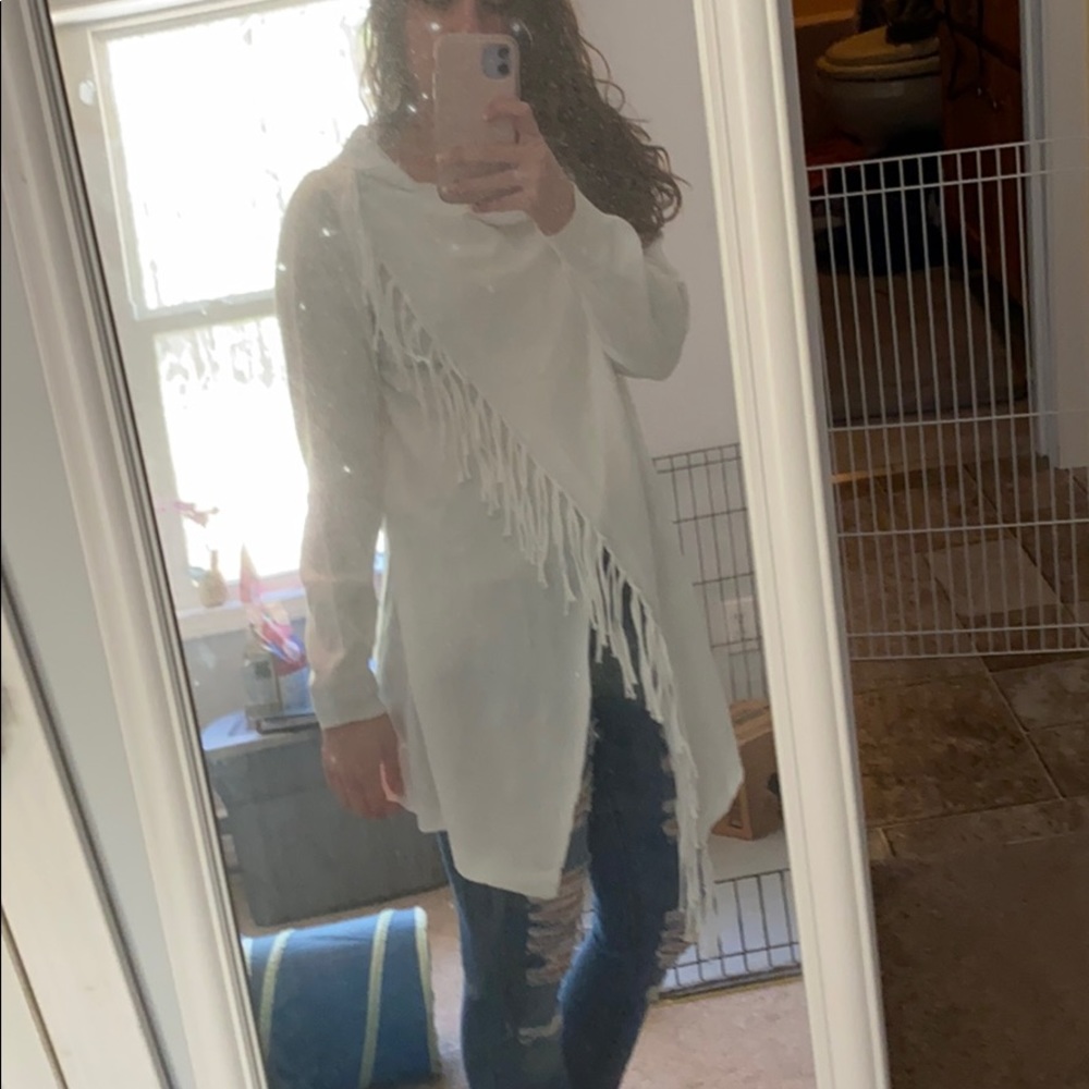 White sweater with fringe